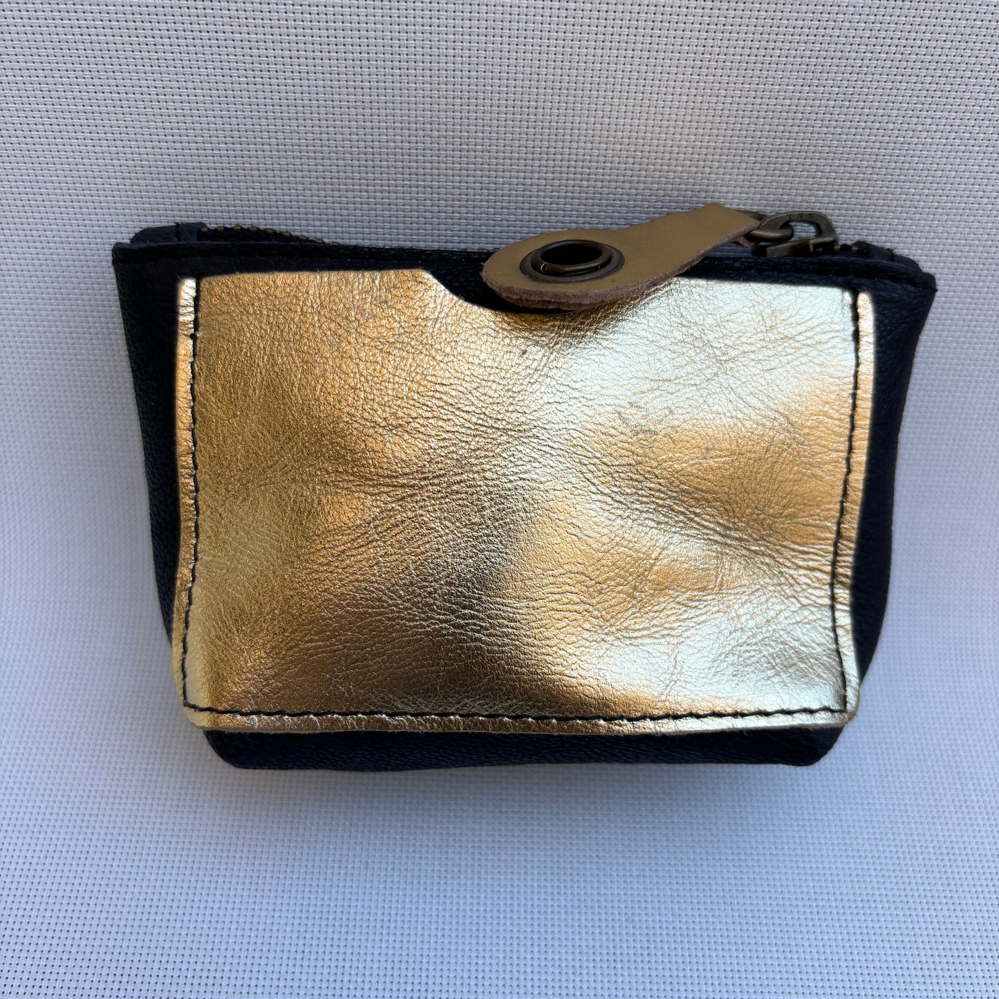 Monedero Wink CAOMKA · Piel natural · Pieza Exclusiva Núm. 15623