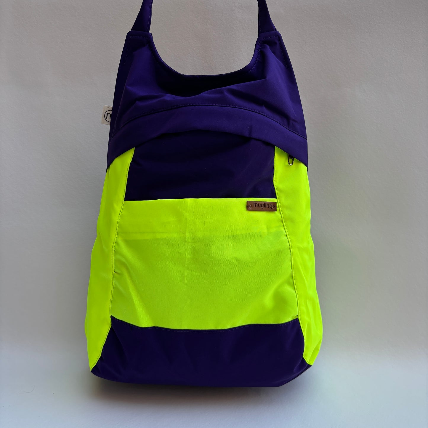 Mochila "Bhaktapur" Verde Fluor + Morado Lila · Pieza Exclusiva 19236